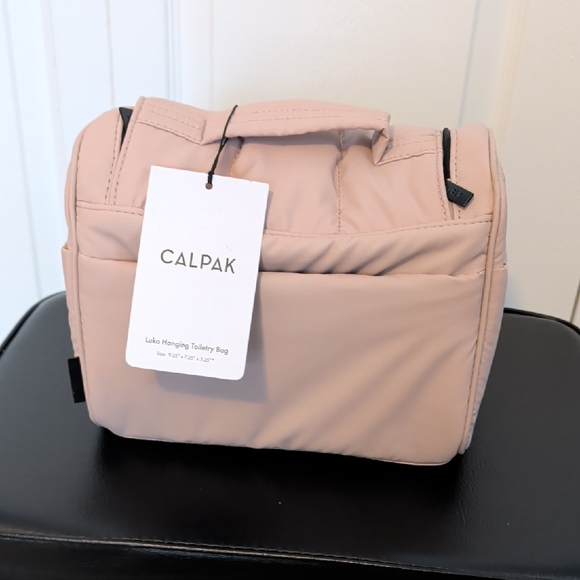 Calpak Handbags - Calpak Blush Hanging Toiletry Bag
